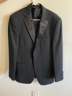 Men’s black suit and vest