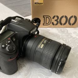 Nikon D300 with AF-S Nikkor 18-200mm VR lens + Nikon Speedlight SB-800 Camera Flash + Camera Bag