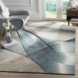 Like new 7 x 9 SAFAVIEH stain resistant Gray/Teal Rug