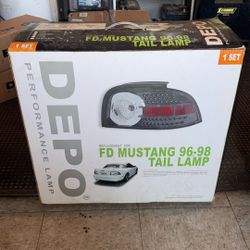 1 SET OF  DEPO FORD MUSTANG 96-98 CHROME TAIL LIGHTS
