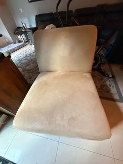 Two faux suede chairs