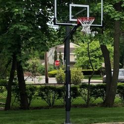 Goaliath 60 inch in ground basketball hoop, adjustable basketball court