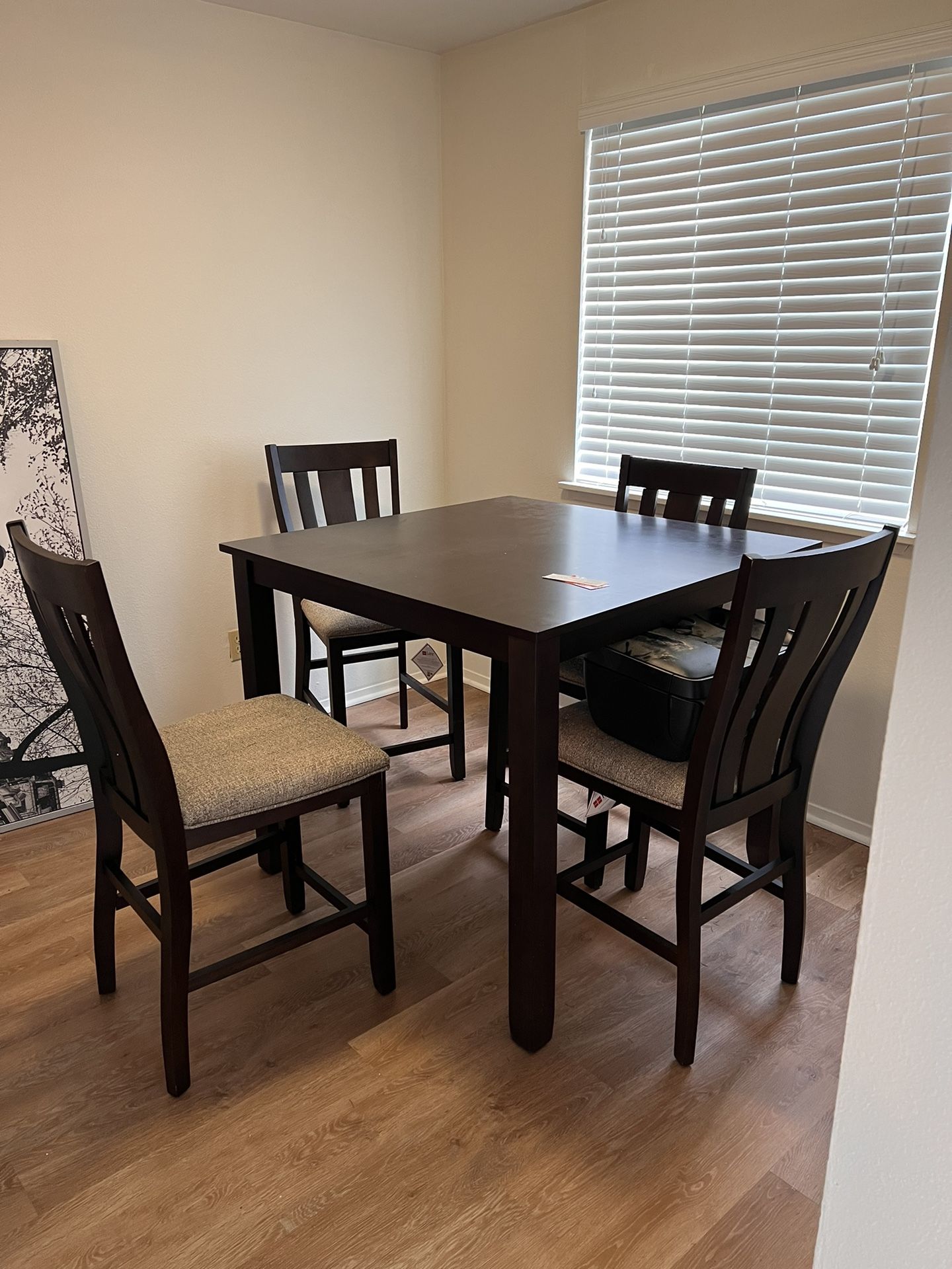 Bar height table and 4 chairs