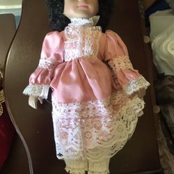 Porcelain doll, over a ft tall. (read Description )