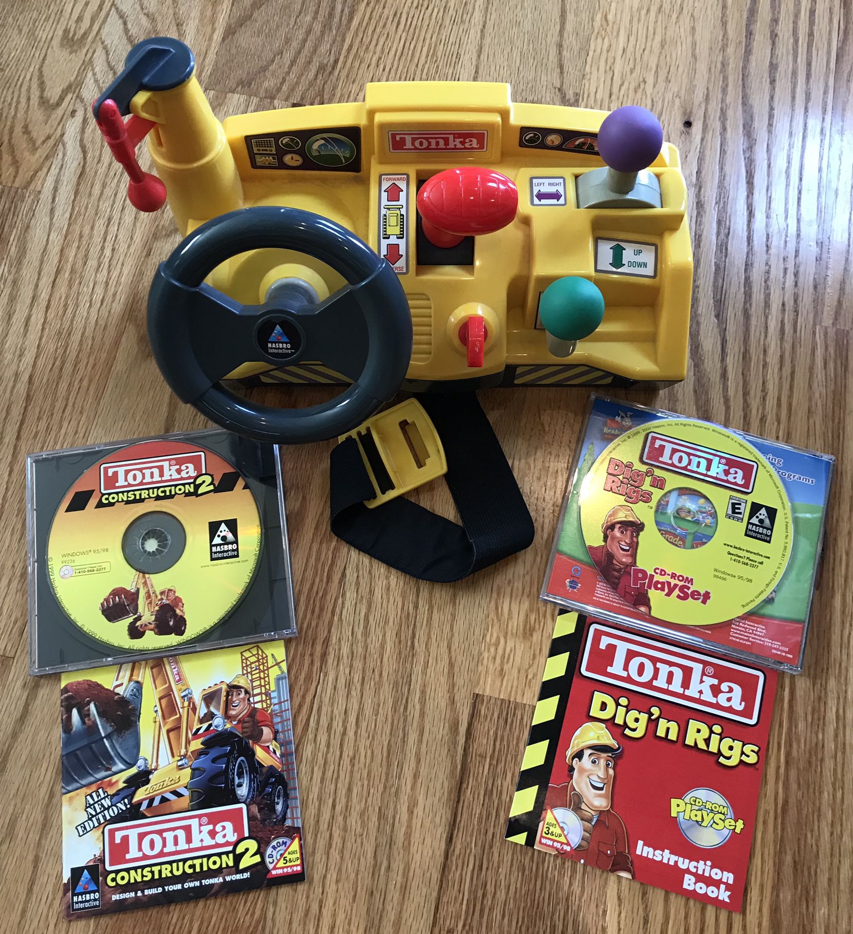 Kids Tonka steering wheel and 2 Tonka PC games