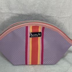 Benefit makeup bag - perfect for travel, featuring a pink and purple design