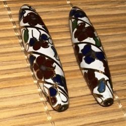 Vintage cloisonné enamel bead with a floral pattern. 