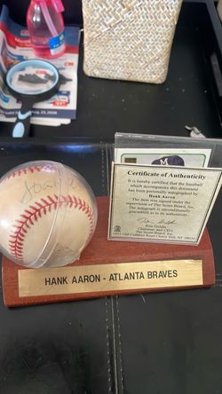 Autographed Hank Aaron baseball COA included