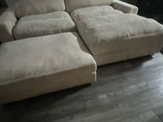 Sectional couch with ottoman