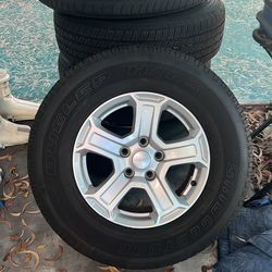 Jeep Wrangler rims with tires