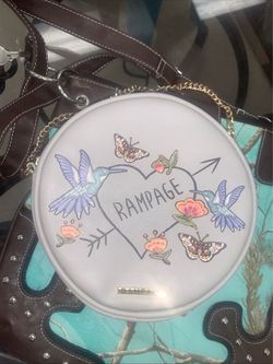 round crossbody/over-the-shoulder purse from  Ravage Boho goth Americana