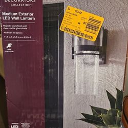 Home Decorators Collection
11.5 in. Majestic 11.5 in. Black
Integrated LED Outdoor Line
Voltage Wall Sconce