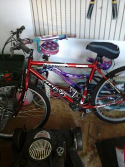 Two bike's one for girl and mens red 15 speed magna like new both