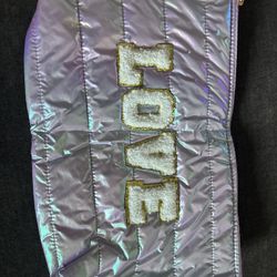 New (LOVE) large bag can be used for multiple things makeup, school supplies ect. 