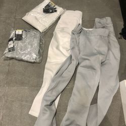 Youth Baseball Gear /5 Pairs Unusedk Mizuno pants 15$  Each, Shoes 10$ A Pair ,helmet 10$ 