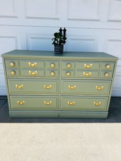 Sage green dresser with gold hardware