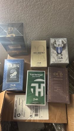 Three boxes full of colognes. All brand new.
