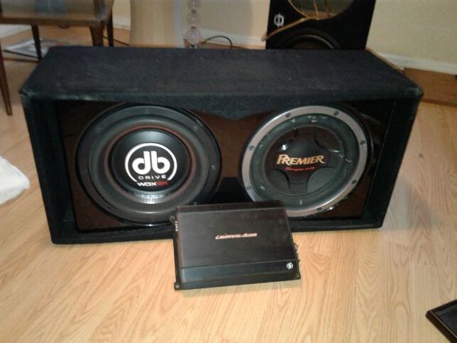 Two mixed 12 inch subs w/ 2000w amp