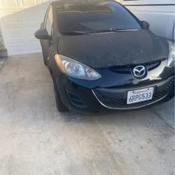 2011 Mazda 2. Only 72K miles. Great gas saver, manual.