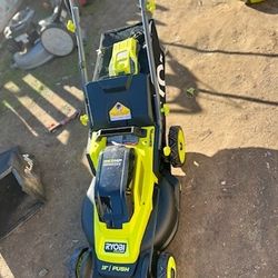 ONE+ HP 18V Brushless 16 in. Cordless Battery Walk Behind Push Lawn Mower with (2) 4.0 Ah Batteries and (1) Charger