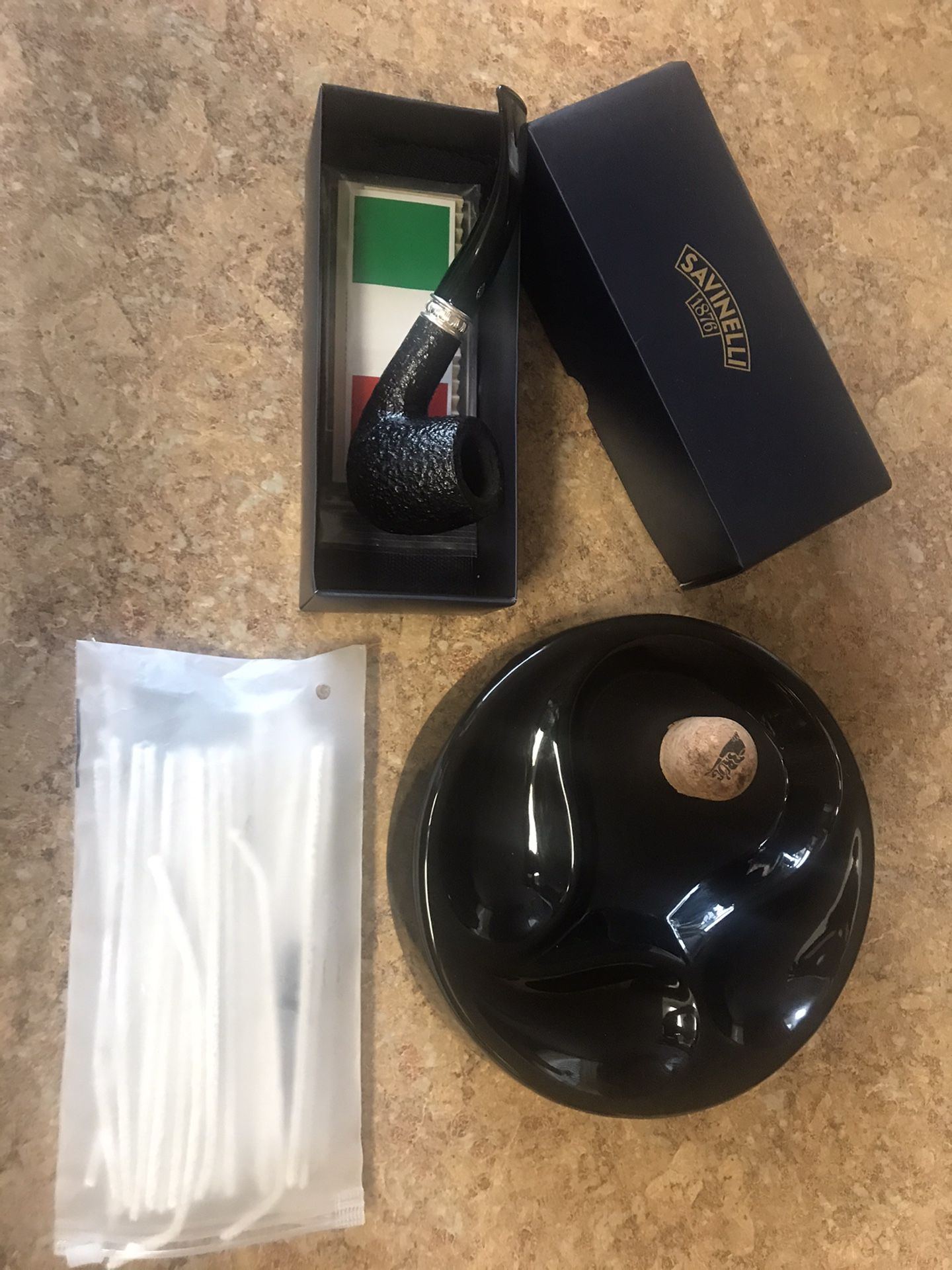 Savinelli tobacco pipe with ashtray.