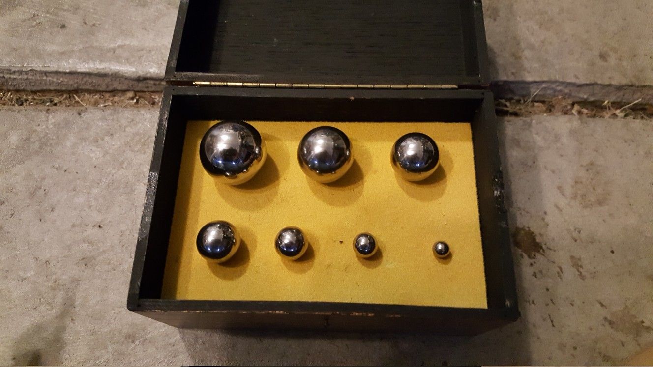 Precision tooling balls in wood case