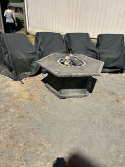 Nice patio set with fire pit.