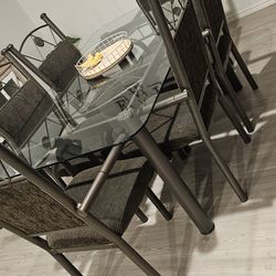 Glass metal Dining table with 6 metal chairs