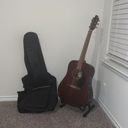Fender Guitar Comes With Bag, Stand And Capo