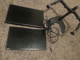 Two monitors and monitor stand