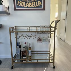 VASAGLE Bar Cart Gold, Home Bar Serving Cart, Wine Cart with 2 Mirrored Shelves, Wine Holders, Glass Holders, for Kitchen, Dining Room, Gold ULRC090A0