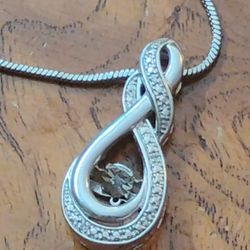 vintage Kay Jewelers sterling silver and diamond infinity knot pendant & necklac