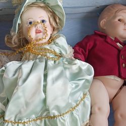 Porcelain Doll Collection From The 1950s And Some Wall Chalk Art