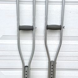 Pair Of Mismatched Crutches 