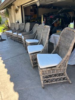 Awesome set of 8 rattan chairs w/cushions. Table pictured not included!