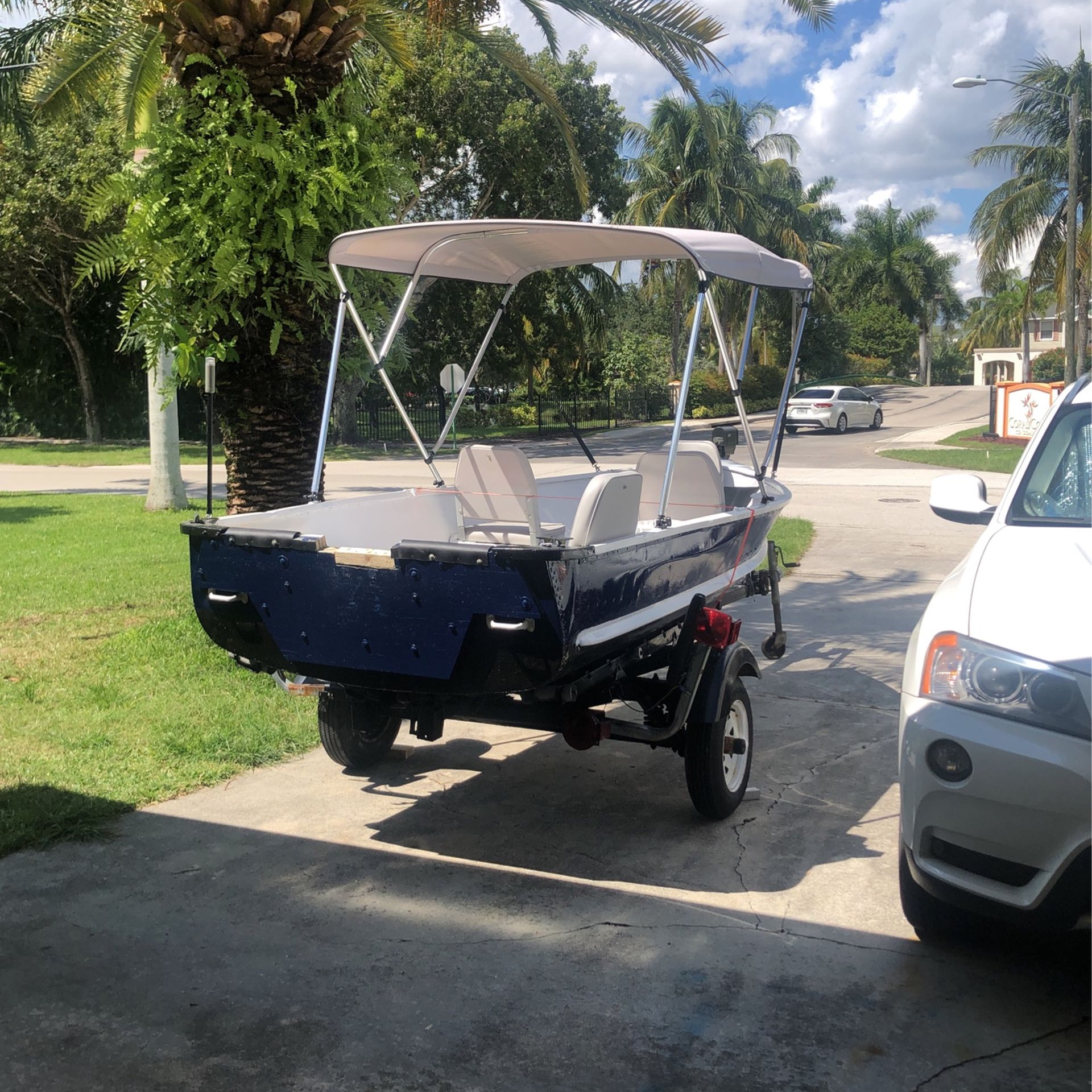 13Ft Florida Aluminum Boat/trailer 7.5 Johnson .4seat/Bimini Roof 