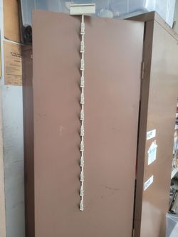 Clip strip for hanging merchandise