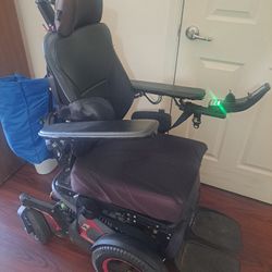 Wheelchair Scooter with Charger, Great Condition Price Negotiable.