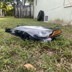 Two Broken Headlights Toyota Corolla 2018