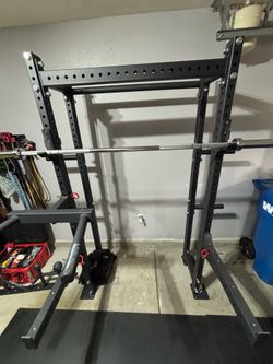 Home gym equipment: treadmill and squat rack