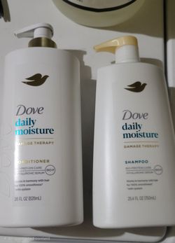 DOVE DAULY MOISTURE SHAMPOO (25.4oz), DOVE CUCUMBER CONDITIONER (28 oz) For $15/$15 Por Los 2
