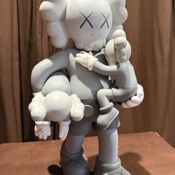 Kaws vinyl figure clean slate..18