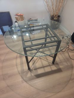 Used glass dining room table and chairs