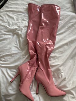 Pink patent leather thigh high boots