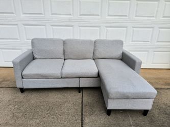 Light gray sectional couch with chaise and reversible ottoman with storage (Delivery available) 🚚