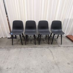 Set of Four Black Molded Plastic Dining Chair with Tapered Legs