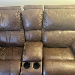 Genuine Leather Couch/Recliner. 