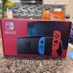 Nintendo Switch With Neon Blue And Neon Red