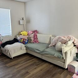 Couch, tv, tv stand and coffee bar