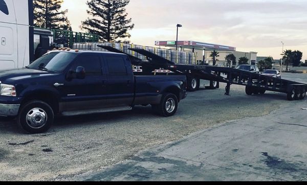 F350 king ranch dually with 3 car hauler for Sale in West